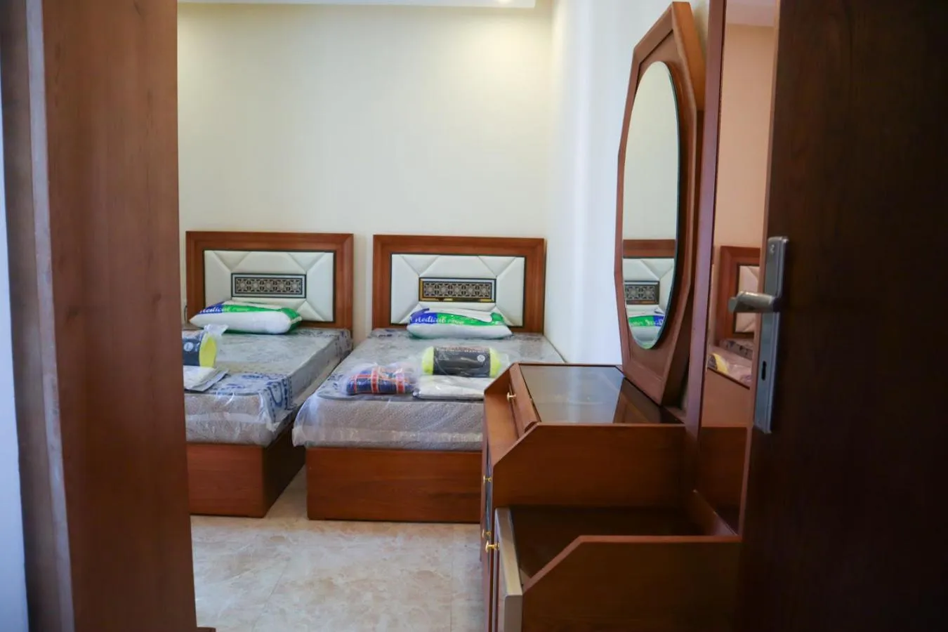 Bed in Hostgool Beach Chalets Mirage bay resort & aqua park