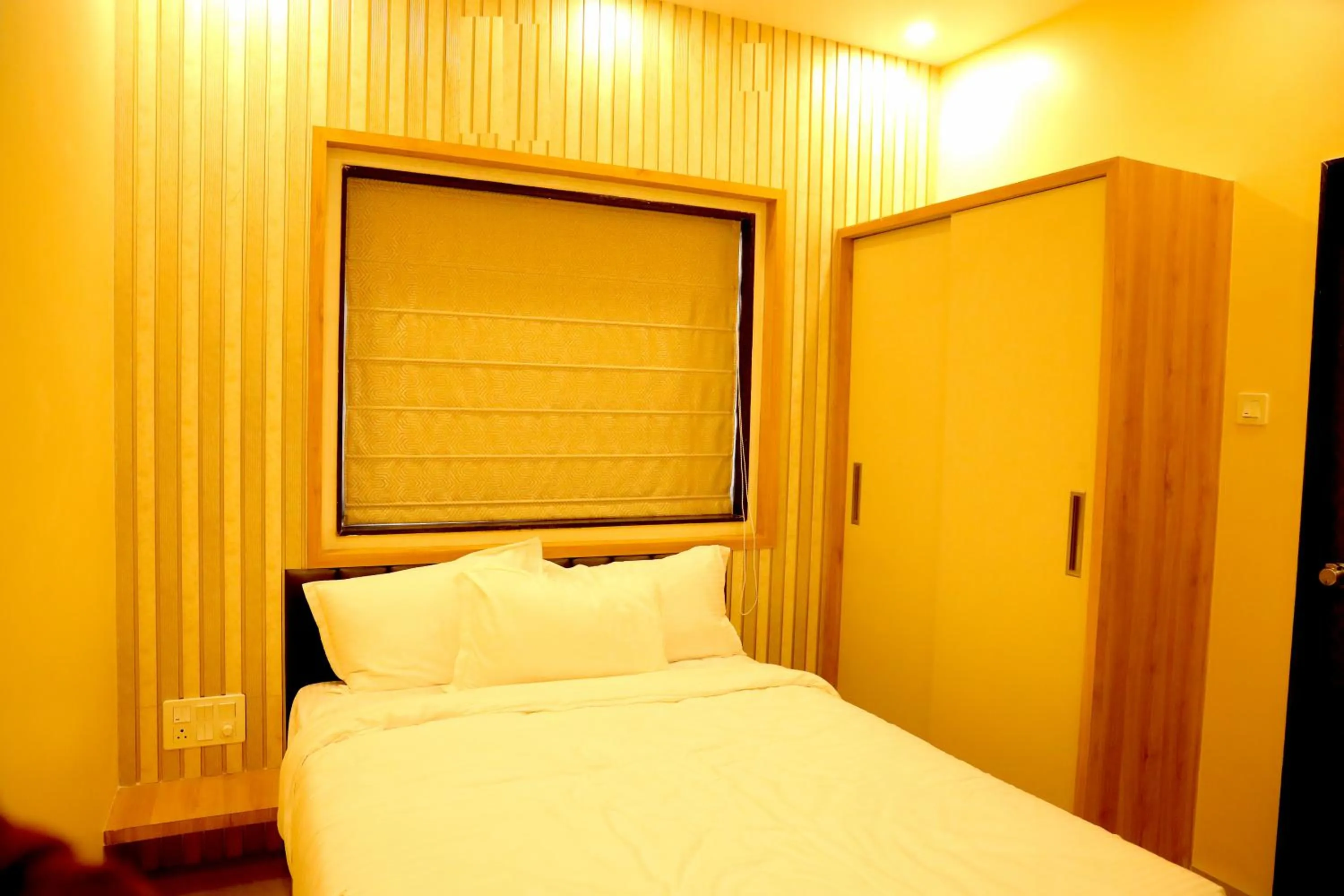 Bed in Hotel Veeratn