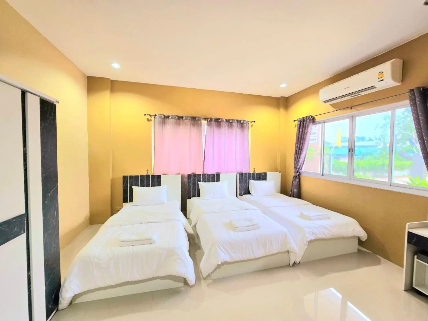 Bed in The Bua Boutique Resort