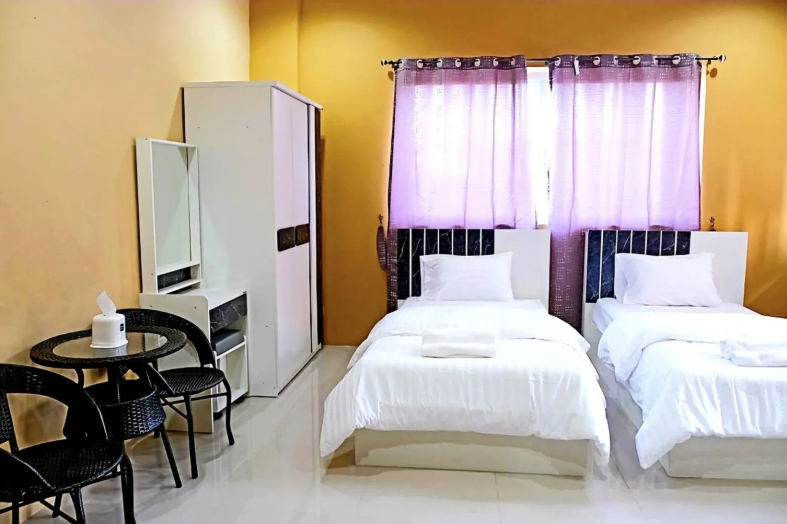 Bed in The Bua Boutique Resort