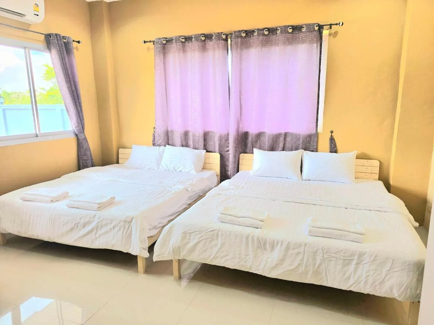Bed in The Bua Boutique Resort
