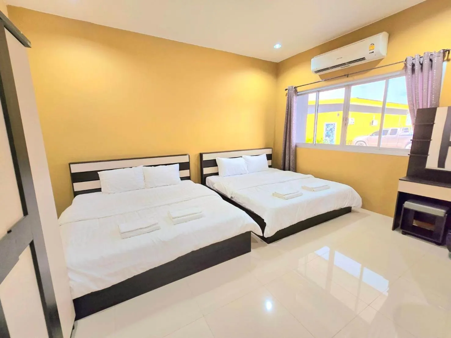 Bed in The Bua Boutique Resort