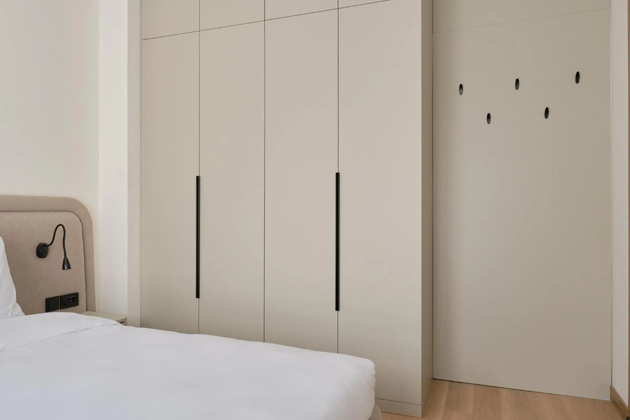 Bed in STYLO Residences & Suites