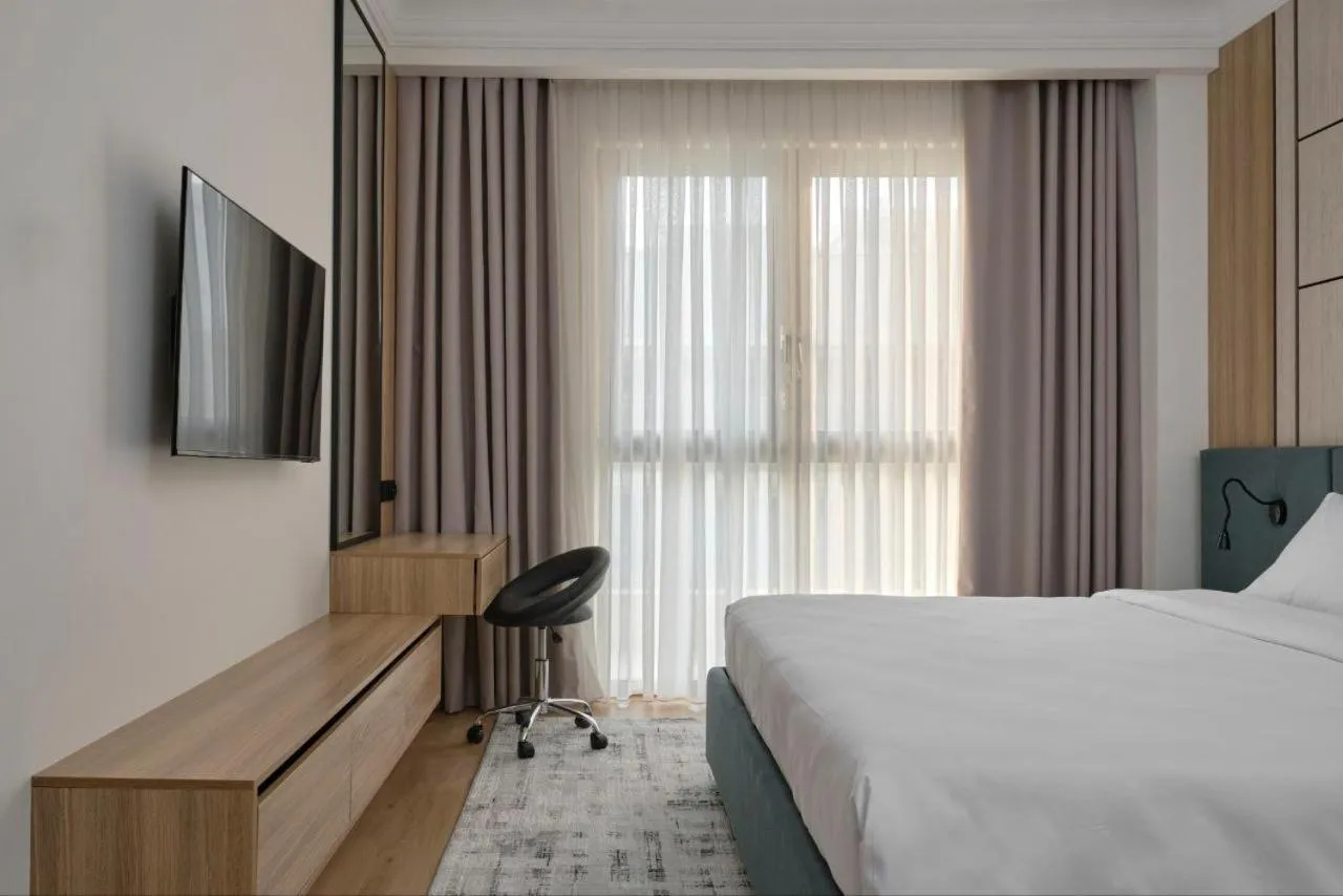 Bed in STYLO Residences & Suites