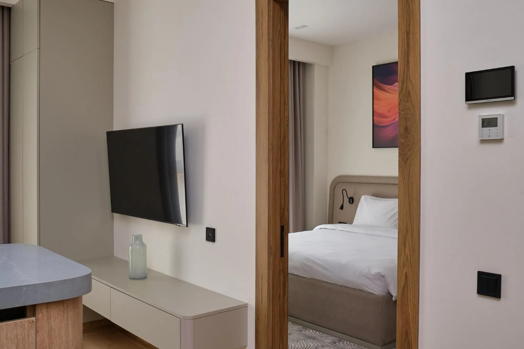 Bed in STYLO Residences & Suites