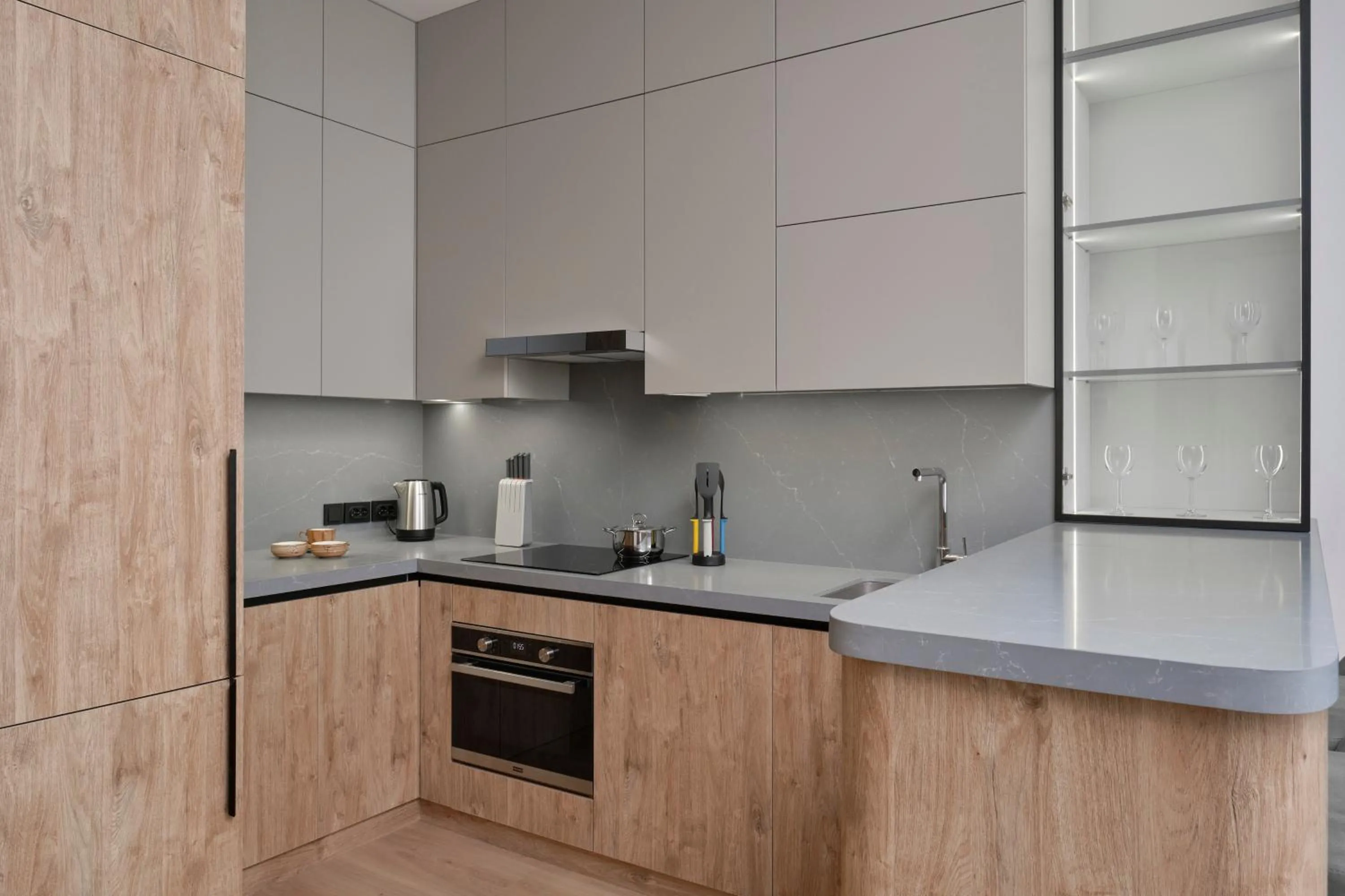 Kitchen or kitchenette in STYLO Residences & Suites