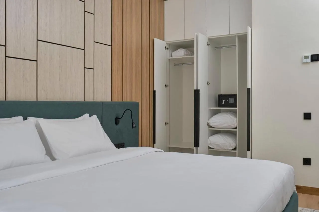 Bed in STYLO Residences & Suites