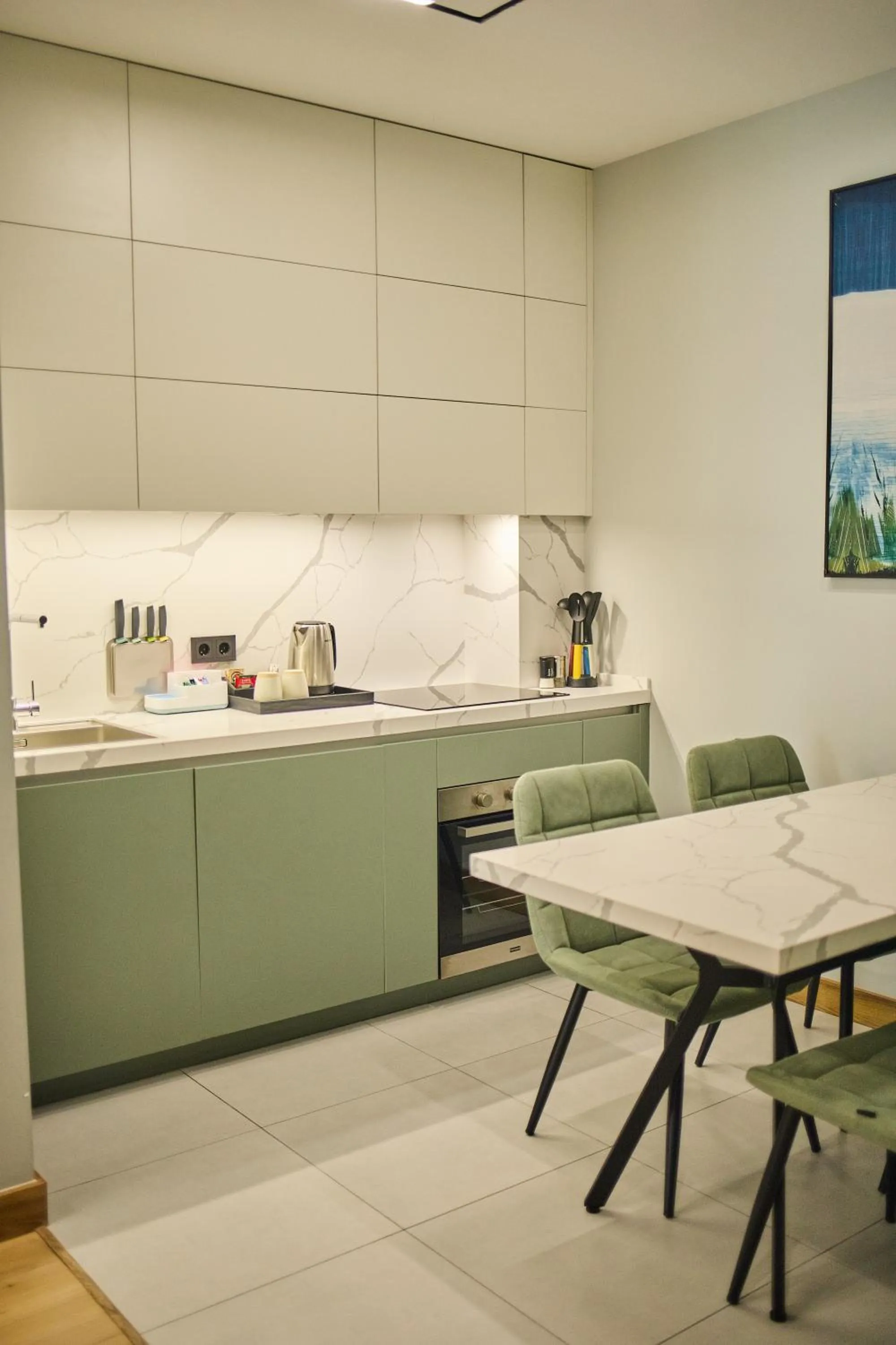 Kitchen or kitchenette in STYLO Residences & Suites