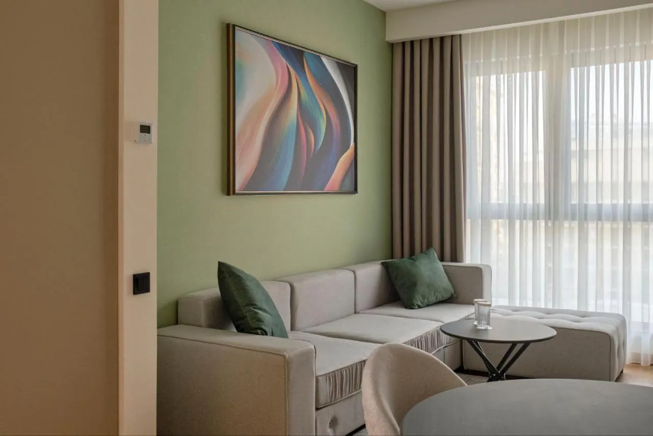 Living room, Bed in STYLO Residences & Suites