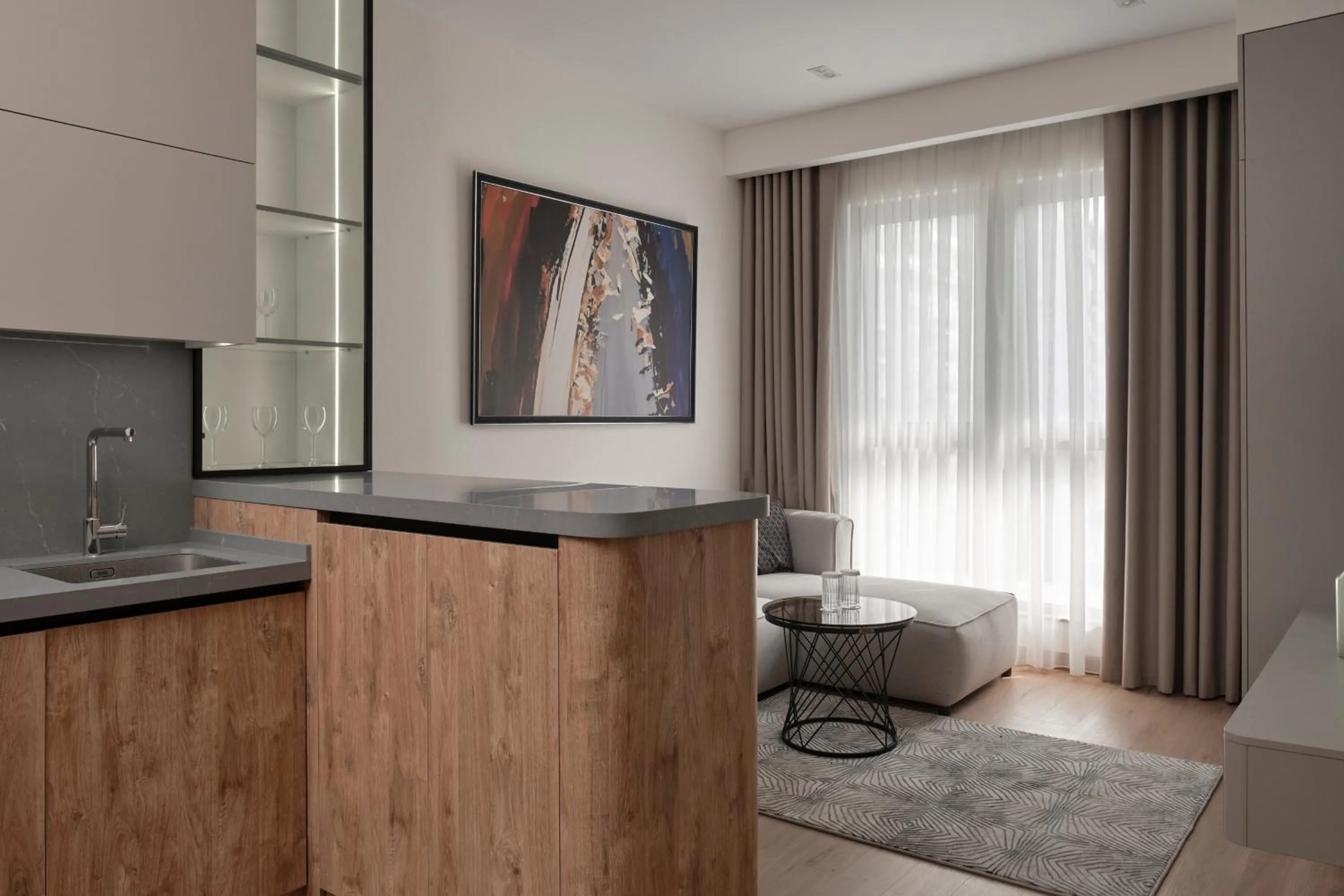 Kitchen or kitchenette in STYLO Residences & Suites