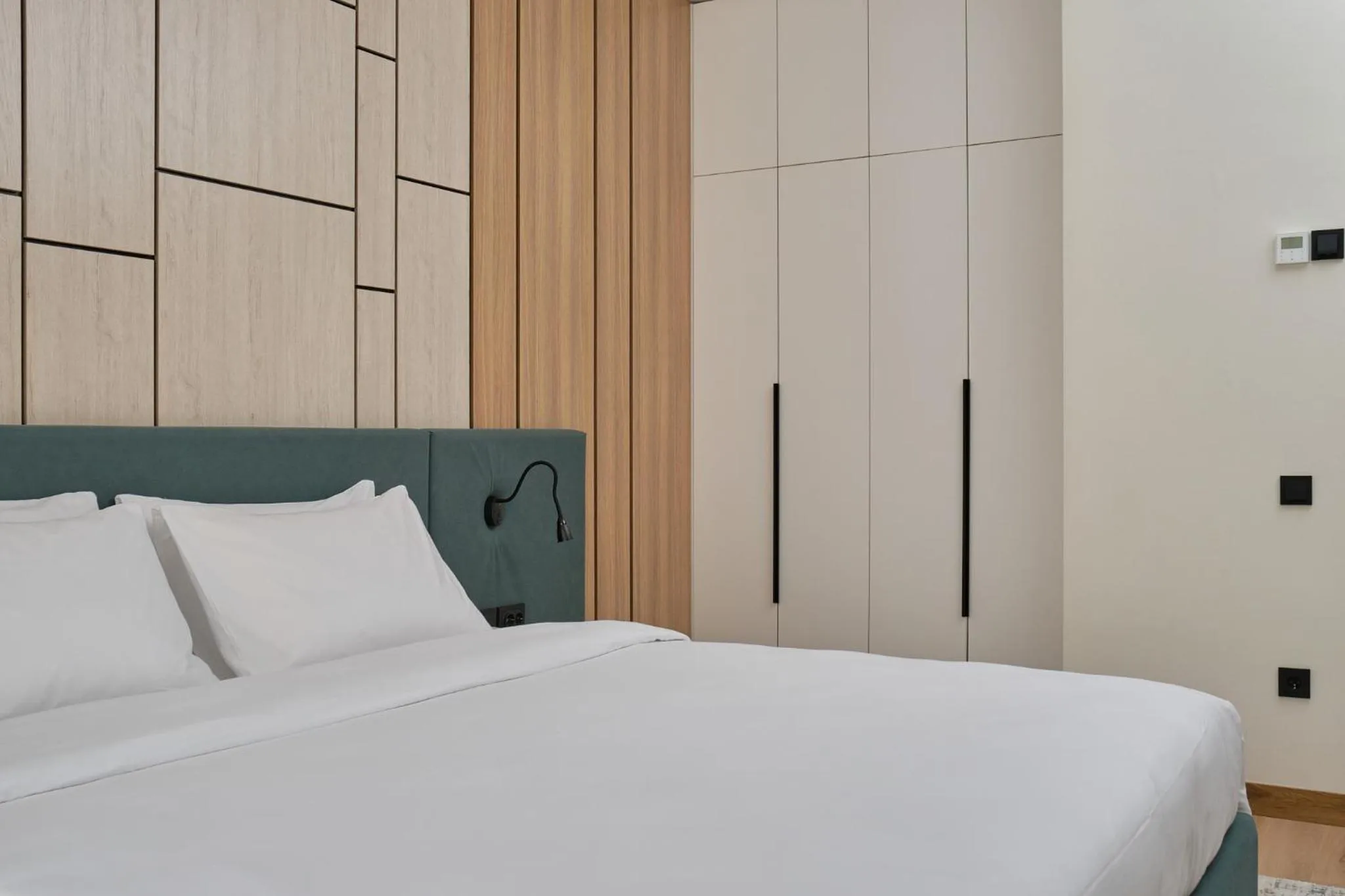 Bed in STYLO Residences & Suites