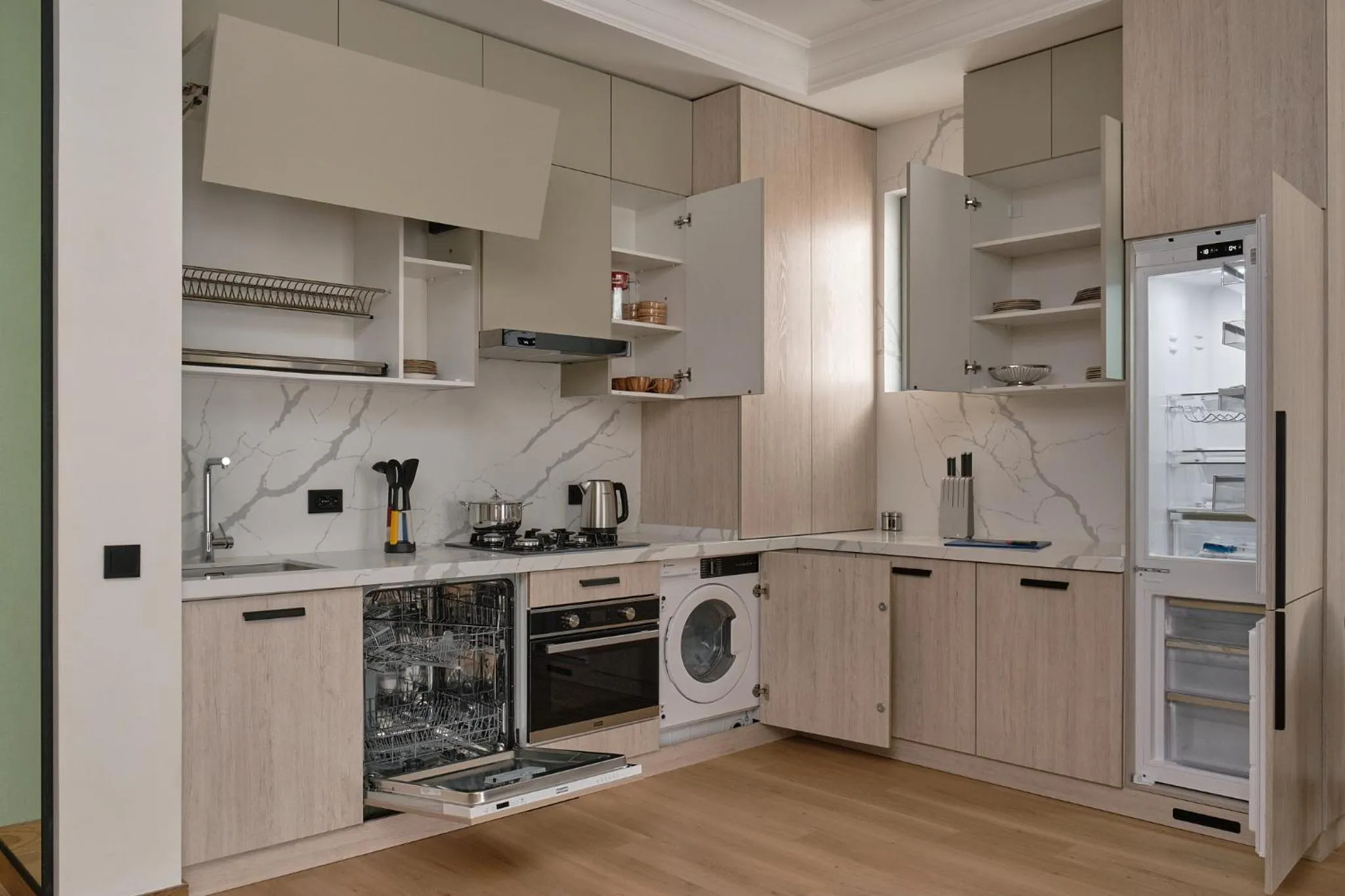 Kitchen or kitchenette in STYLO Residences & Suites