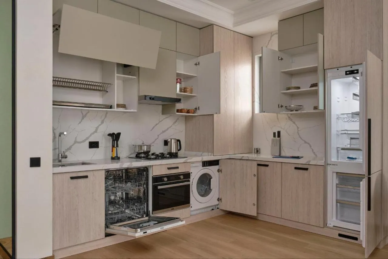 Kitchen or kitchenette in STYLO Residences & Suites