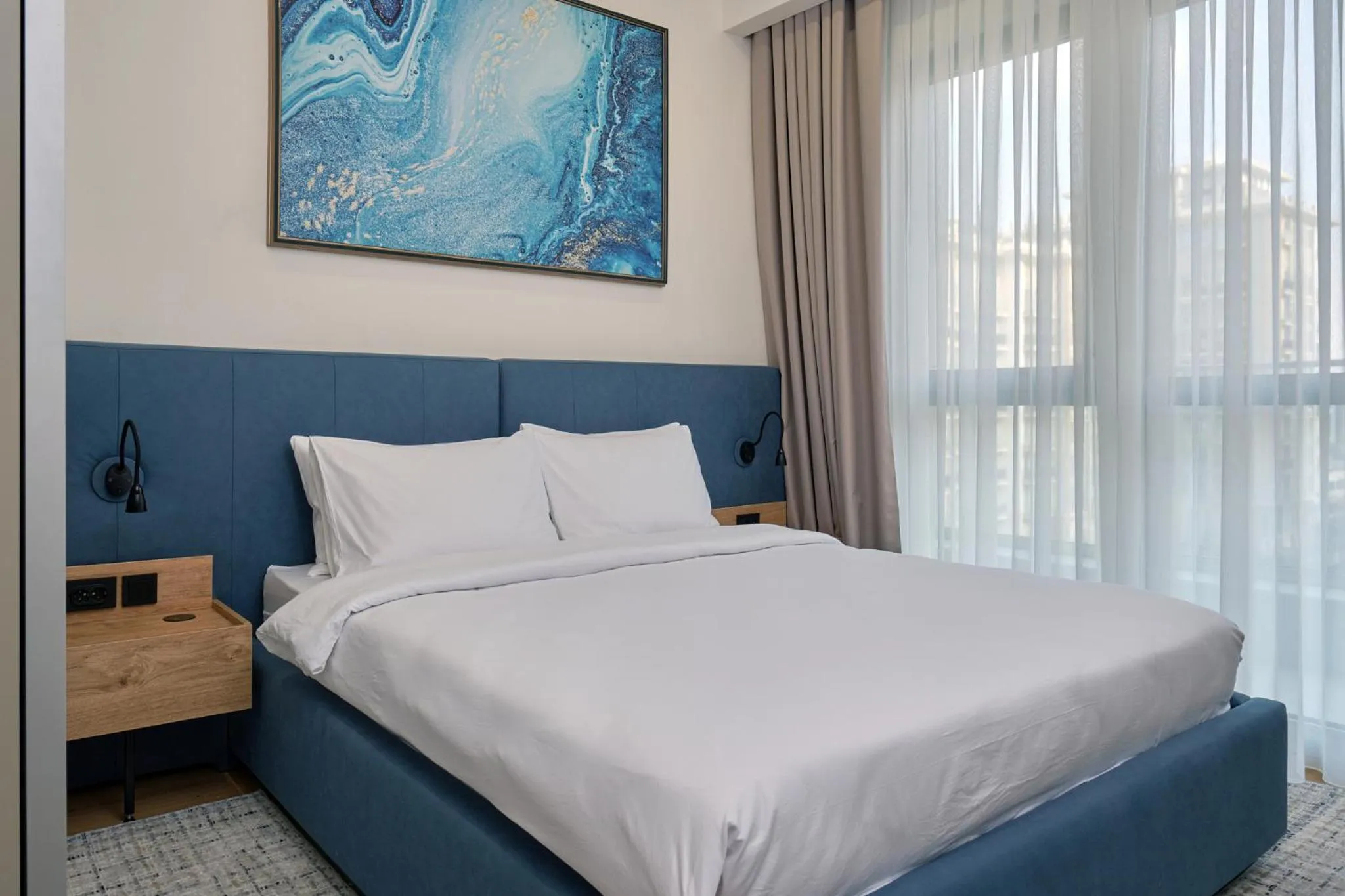 Bed in STYLO Residences & Suites