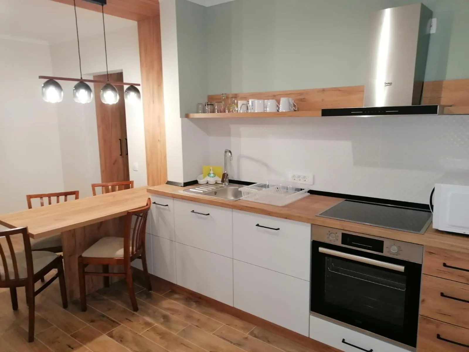 Kitchen or kitchenette in Apartament Alena Oradea