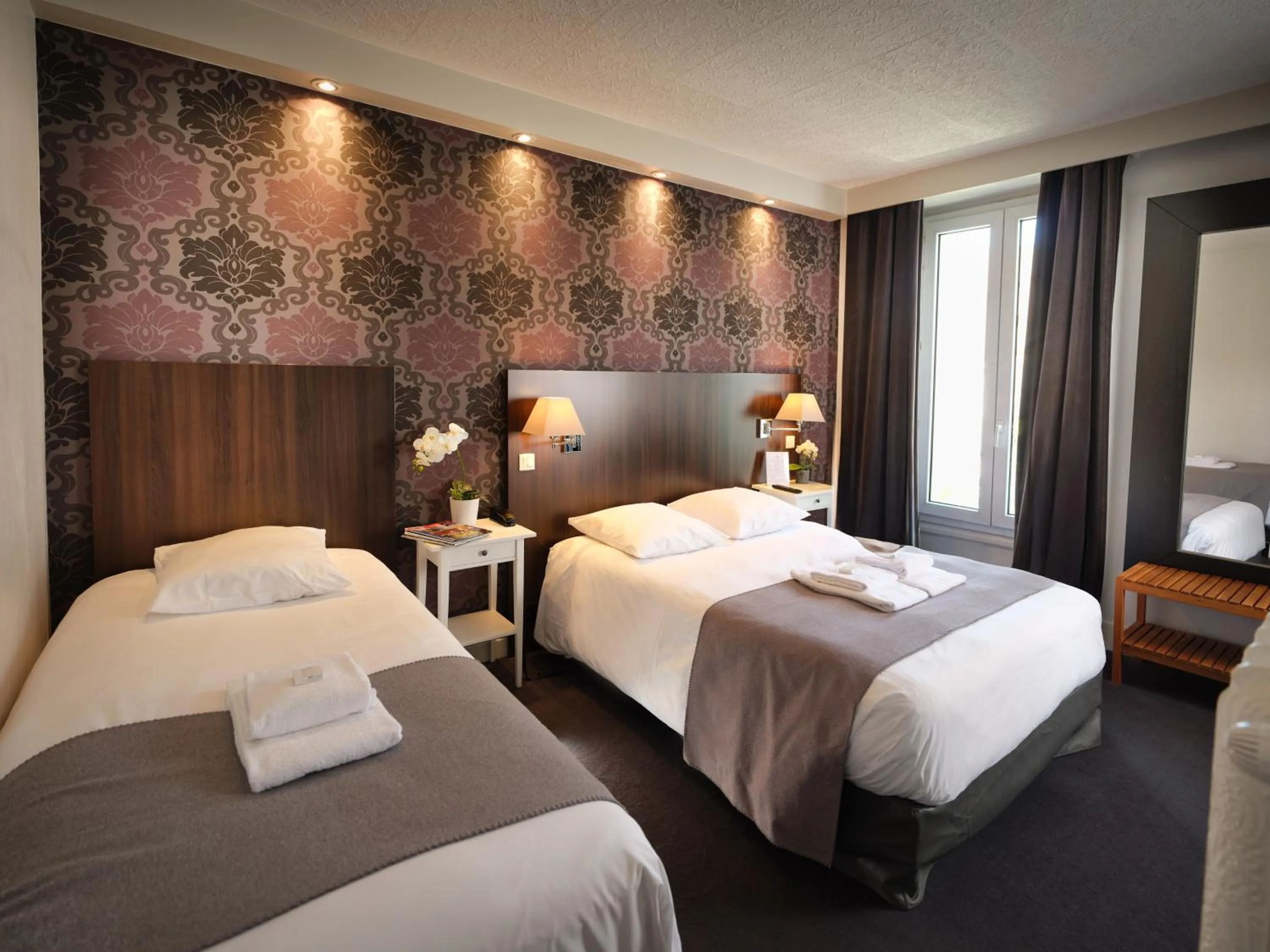 Bed in Hotel Les Negociants