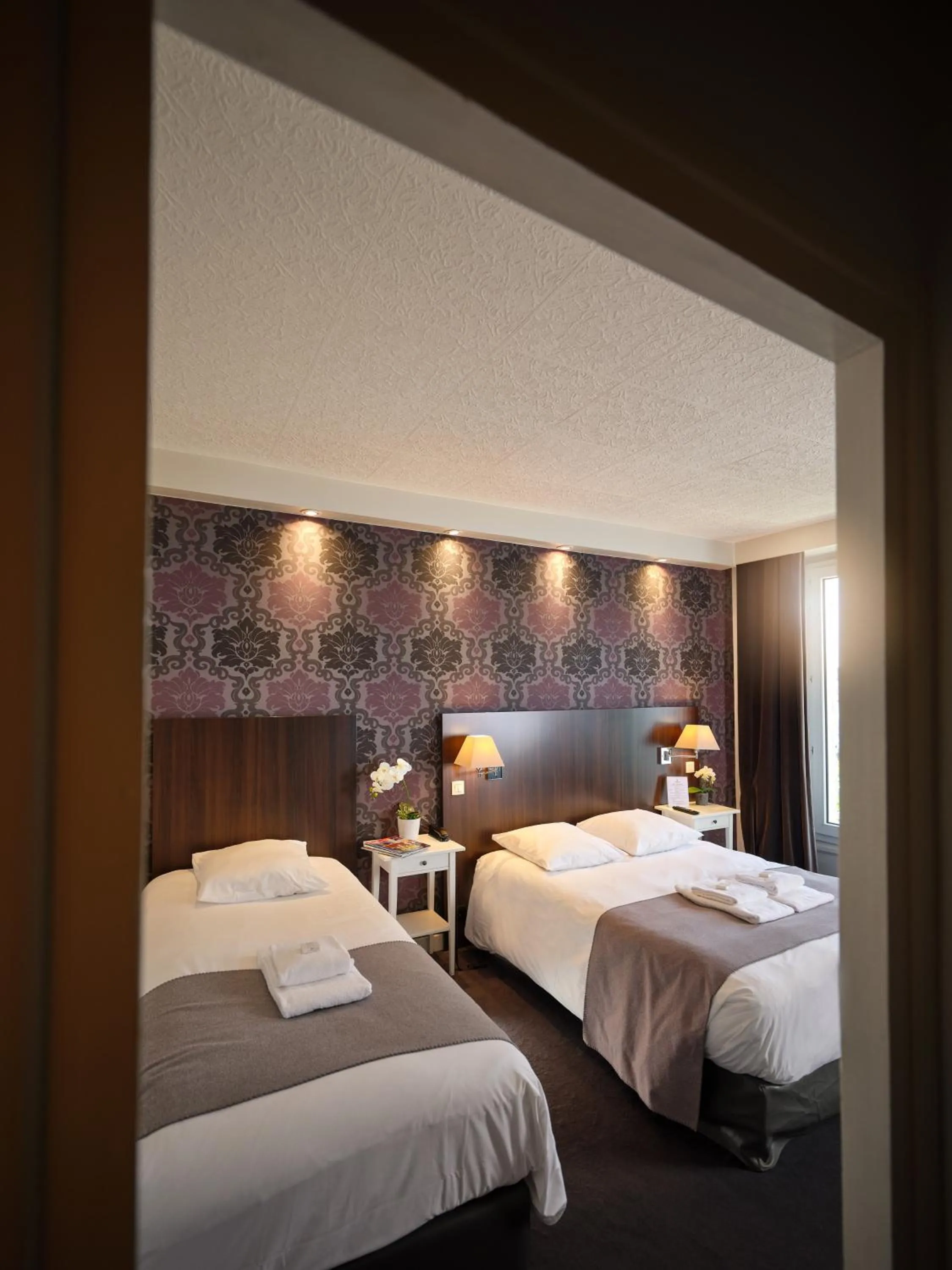 Bed in Hotel Les Negociants