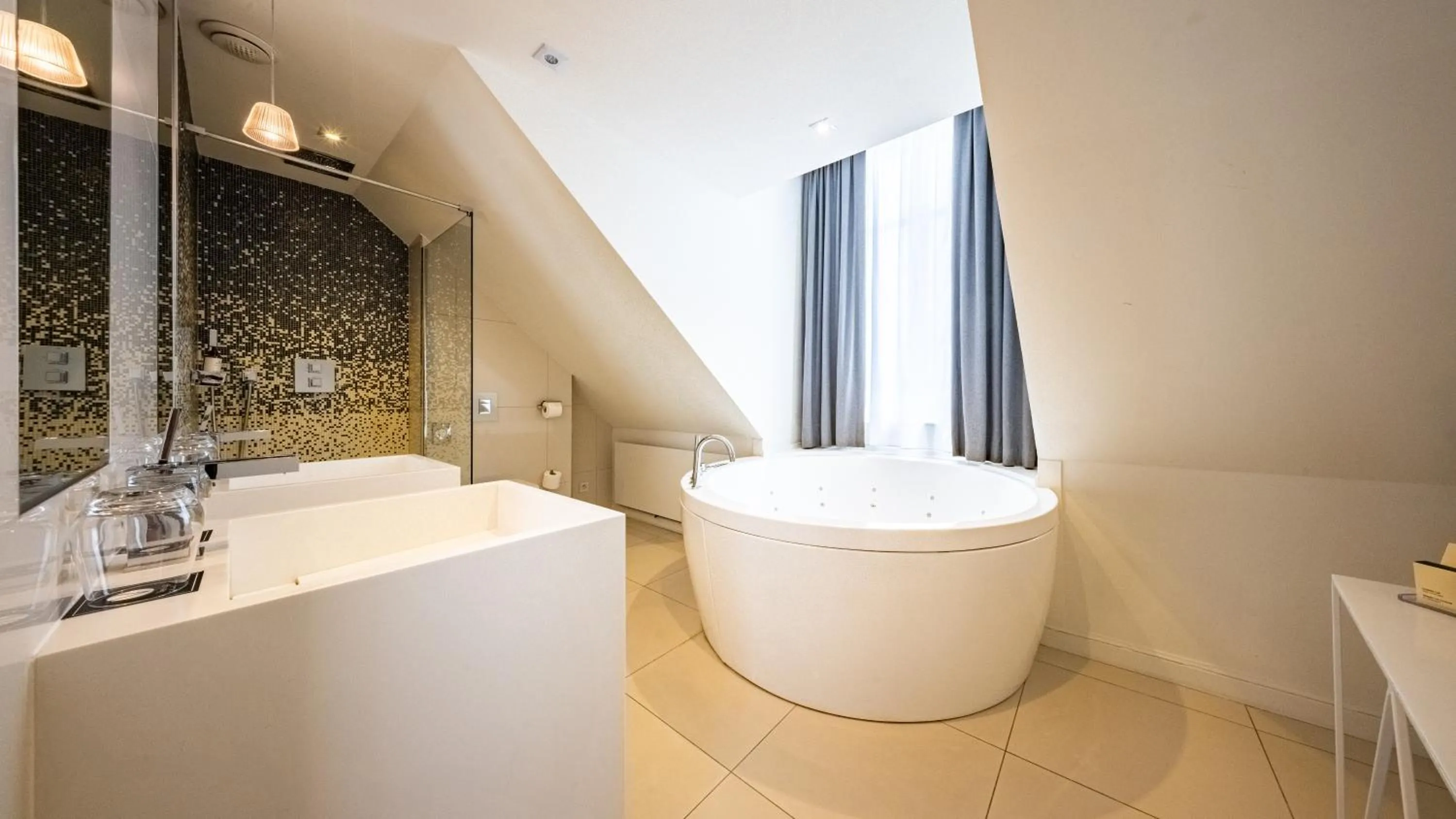 Bathroom in Vertigo Hotel, By Marriott, a Member of Design Hotels