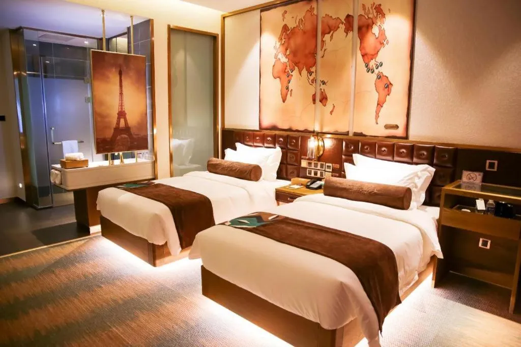 Bed in James Joyce Coffetel Shijiazhuang Wanda Plaza Tangu Metro Station