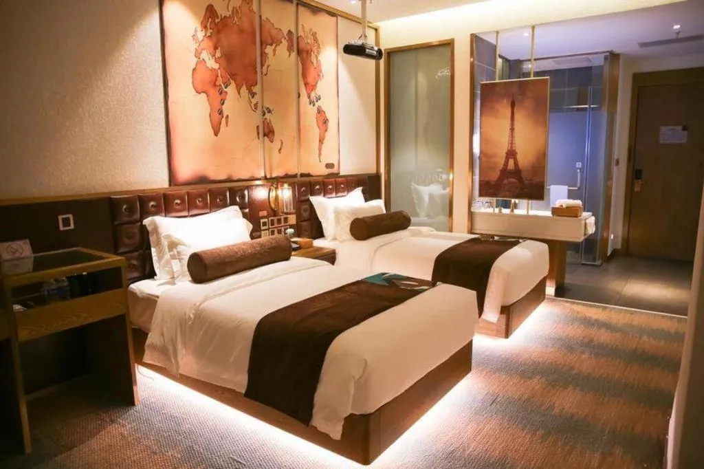 Bed in James Joyce Coffetel Shijiazhuang Wanda Plaza Tangu Metro Station