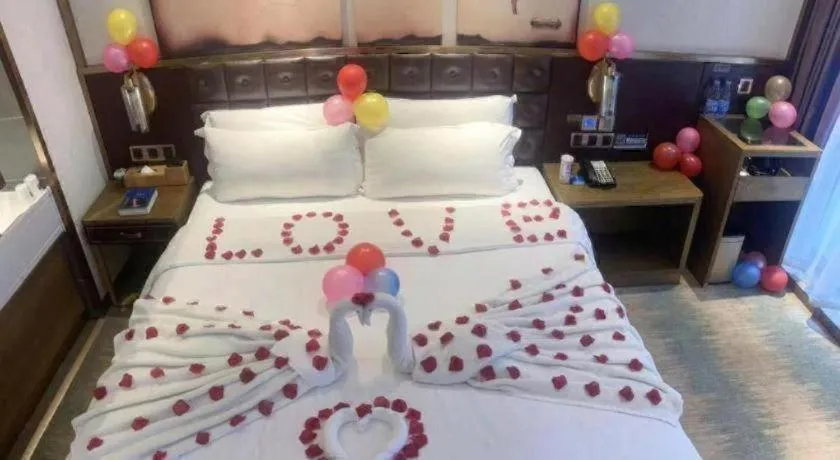 Bed in James Joyce Coffetel Shijiazhuang Wanda Plaza Tangu Metro Station