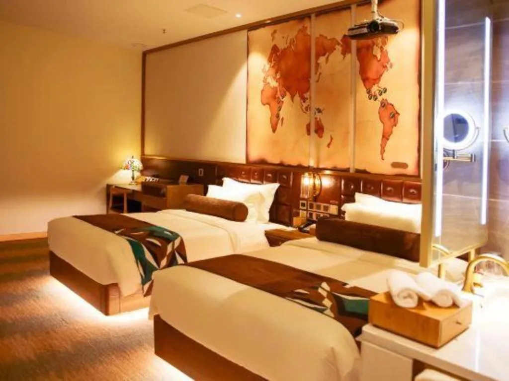 Bed in James Joyce Coffetel Shijiazhuang Wanda Plaza Tangu Metro Station