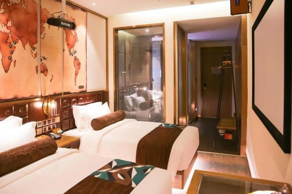 Bed in James Joyce Coffetel Shijiazhuang Wanda Plaza Tangu Metro Station