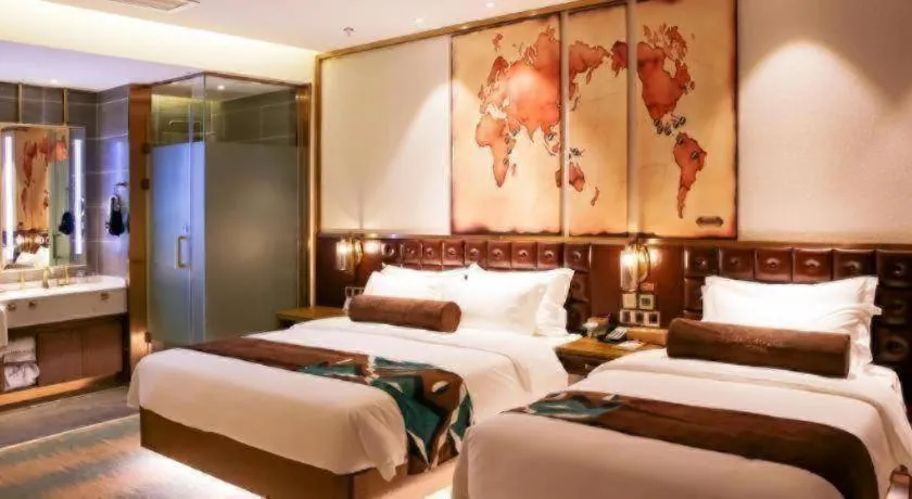 Bed in James Joyce Coffetel Shijiazhuang Wanda Plaza Tangu Metro Station