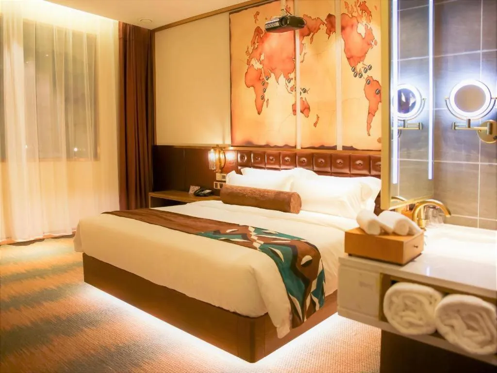 Bed in James Joyce Coffetel Shijiazhuang Wanda Plaza Tangu Metro Station