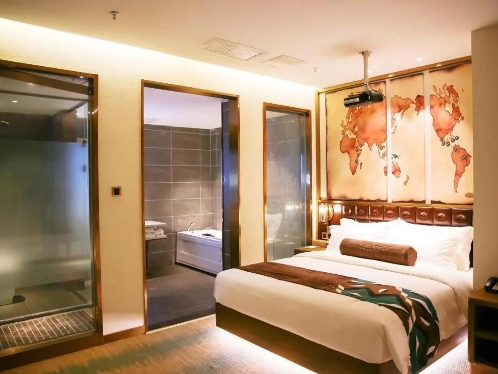 Bed in James Joyce Coffetel Shijiazhuang Wanda Plaza Tangu Metro Station