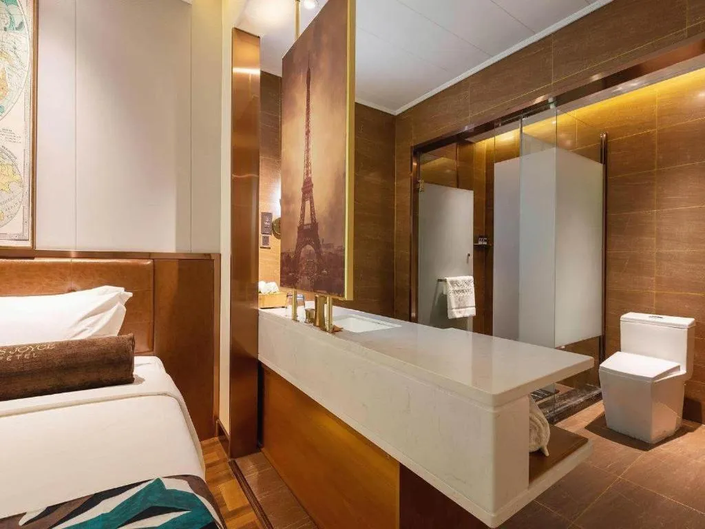 Bed in James Joyce Coffetel Anyang Railway Station Wenfeng Avenue Yinxu Scenic Spot