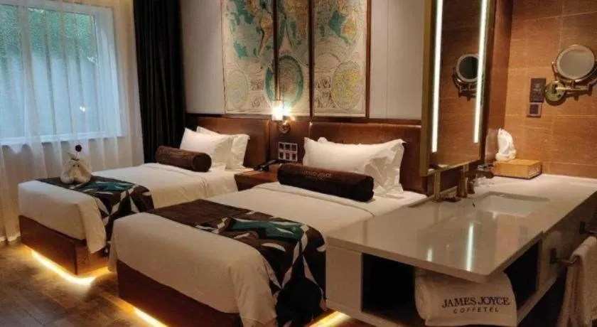 Bed in James Joyce Coffetel Anyang Railway Station Wenfeng Avenue Yinxu Scenic Spot