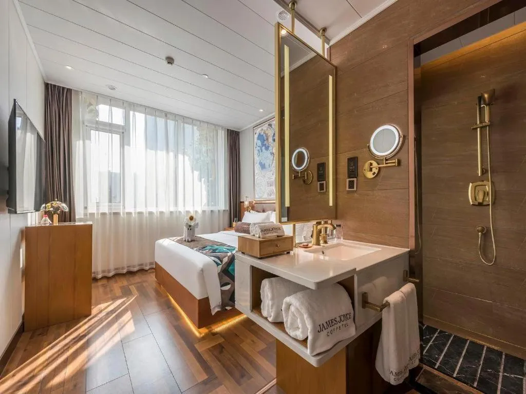 Bed in James Joyce Coffetel Anyang Railway Station Wenfeng Avenue Yinxu Scenic Spot