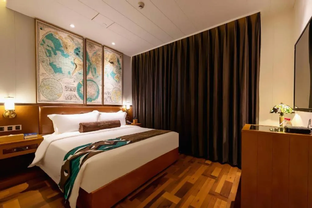 Bed in James Joyce Coffetel Anyang Railway Station Wenfeng Avenue Yinxu Scenic Spot