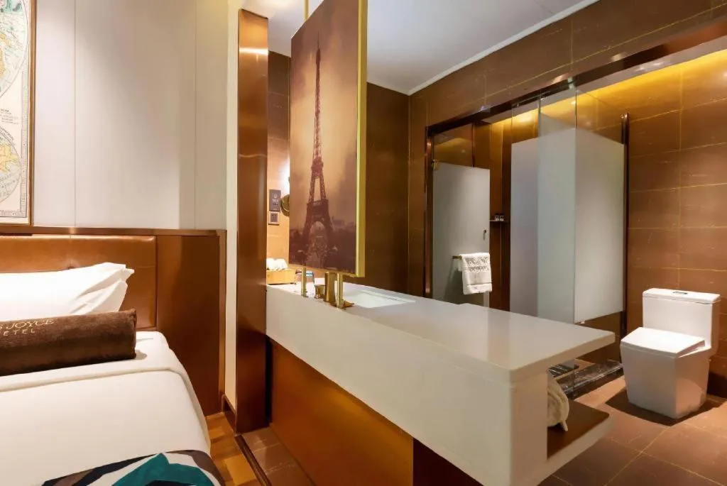 Bed in James Joyce Coffetel Anyang Railway Station Wenfeng Avenue Yinxu Scenic Spot