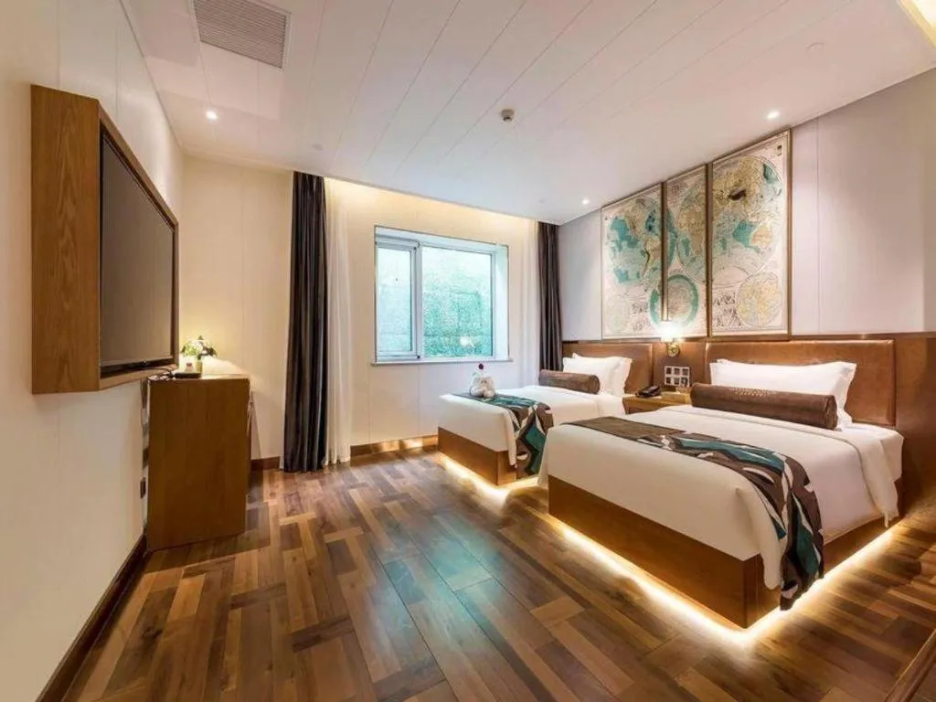 Bed in James Joyce Coffetel Anyang Railway Station Wenfeng Avenue Yinxu Scenic Spot