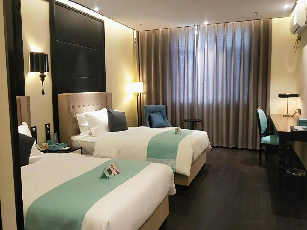 Bed in Xana Hotelle Yining Airport Road Jinwuyuan