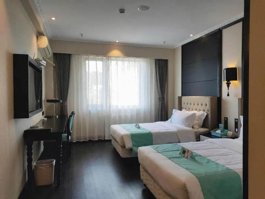 Bed in Xana Hotelle Yining Airport Road Jinwuyuan