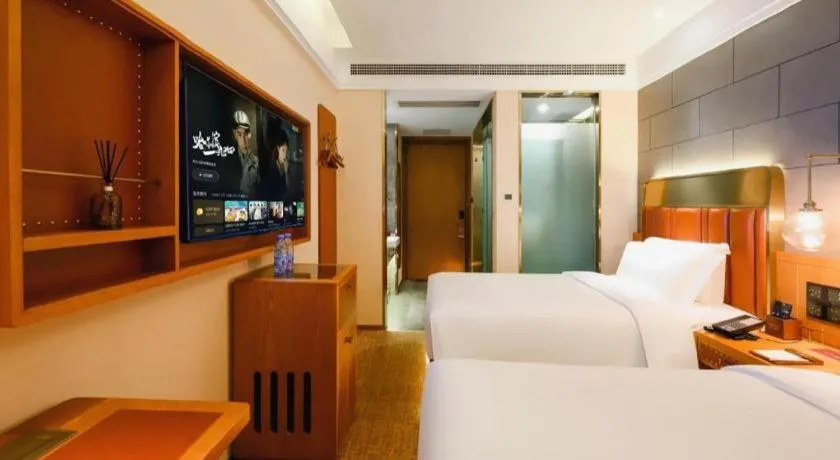 Bed in James Joyce Coffetel Tianjin Railway Station