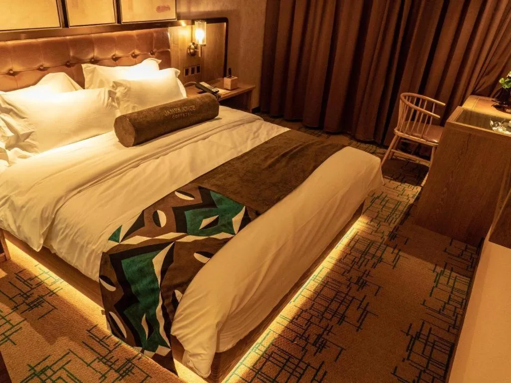 Bed in James Joyce Coffetel Tianjin Railway Station