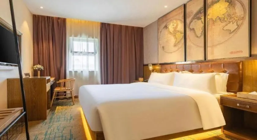 Bed in James Joyce Coffetel Tianjin Railway Station