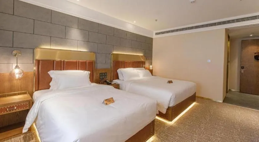 Bed in James Joyce Coffetel Tianjin Railway Station