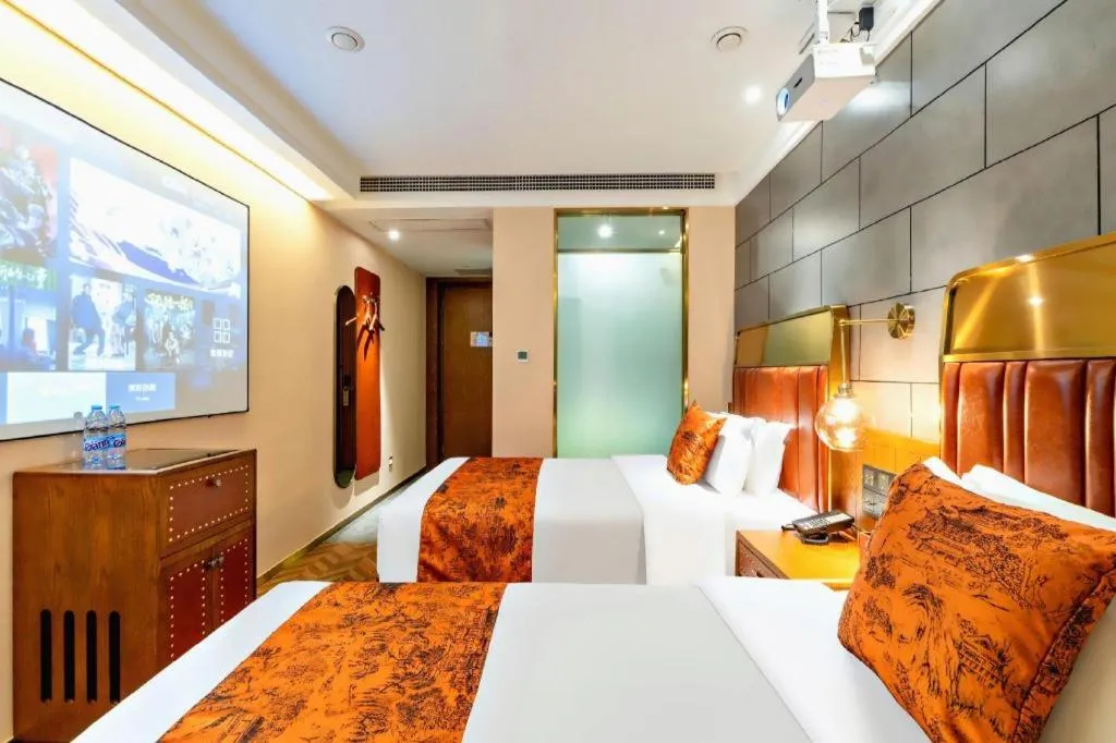 Bed in James Joyce Coffetel Tianjin Railway Station