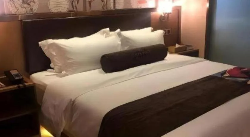 Bed in James Joyce Coffetel Tianjin Railway Station