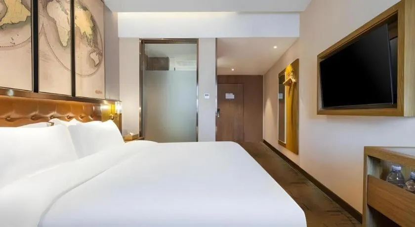 Bed in James Joyce Coffetel Tianjin Railway Station