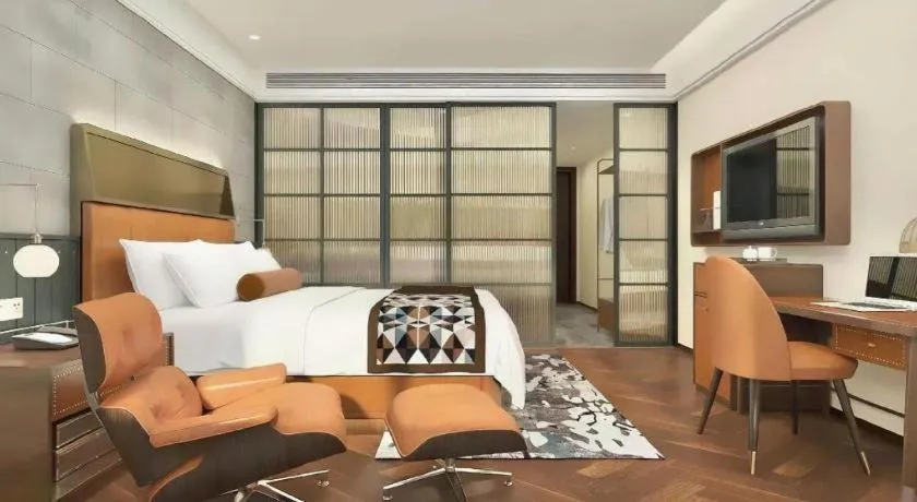 Bed in James Joyce Coffetel Tianjin Railway Station