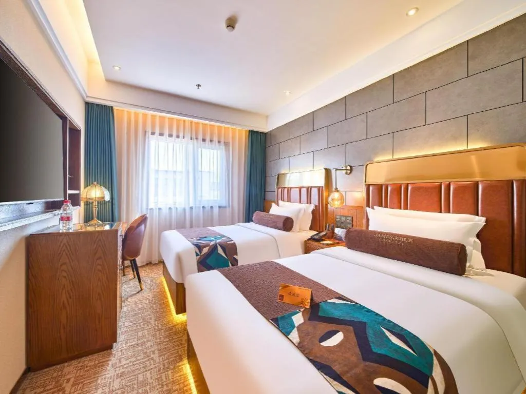 Bed in James Joyce Coffetel Tianjin Railway Station