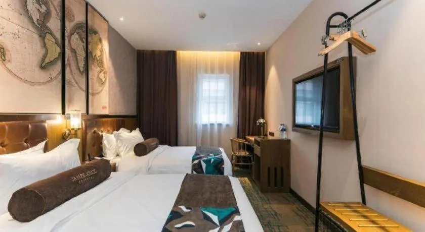 Bed in James Joyce Coffetel Tianjin Railway Station