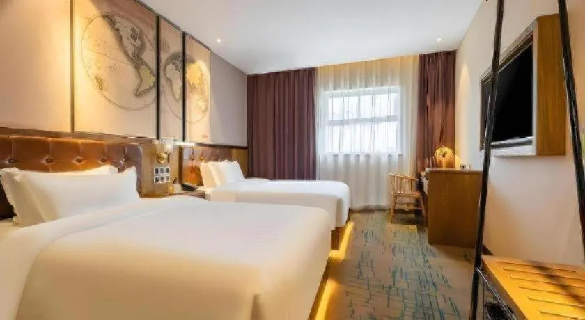 Bed in James Joyce Coffetel Tianjin Railway Station