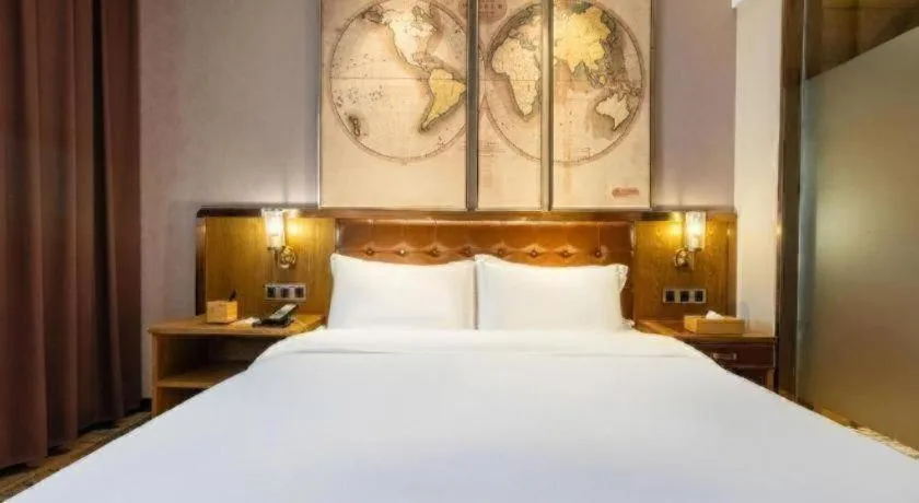 Bed in James Joyce Coffetel Tianjin Railway Station